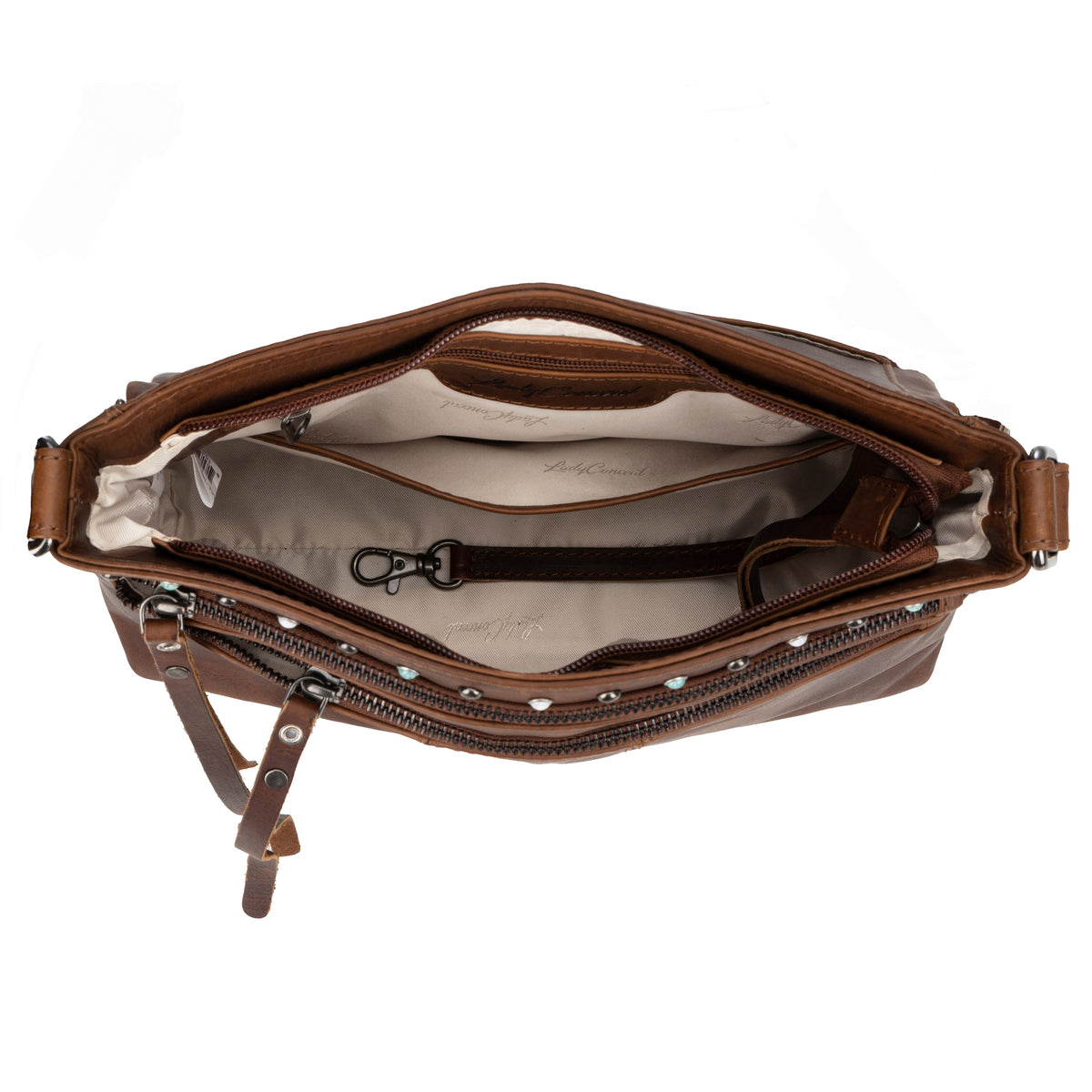 An open brown leather crossbody bag showing its interior compartments, beige lining, and zipper details against a white background.